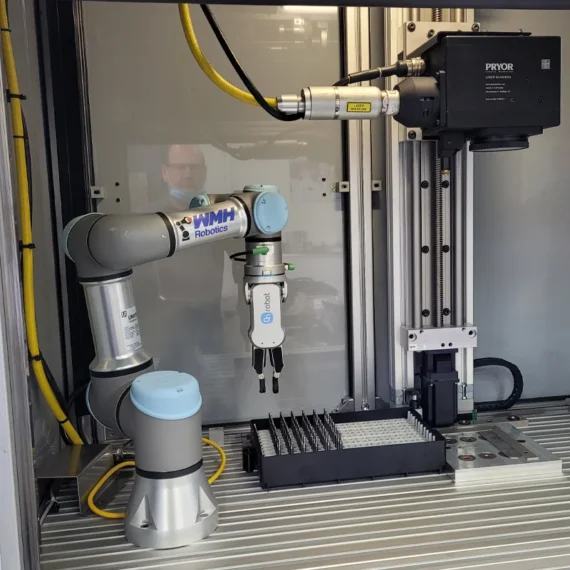 automated part handling: robot pick and place laser system